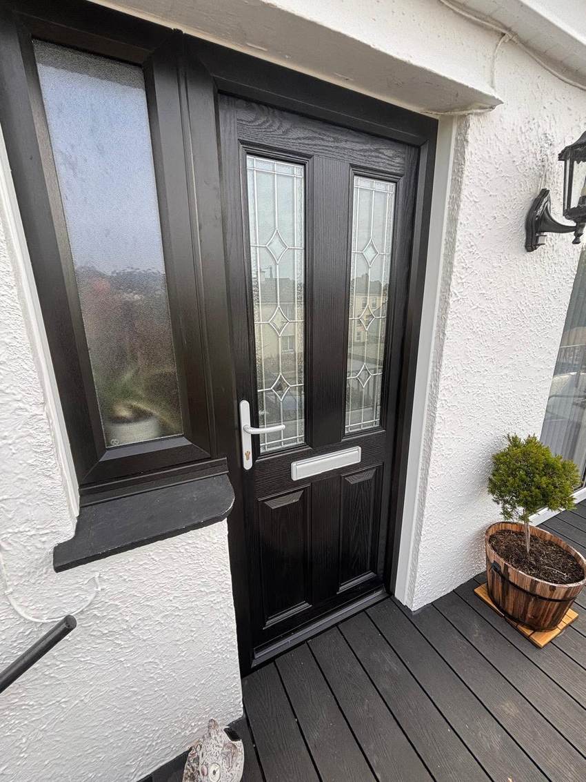 Black composite front door fitted by Cornwall uPVC