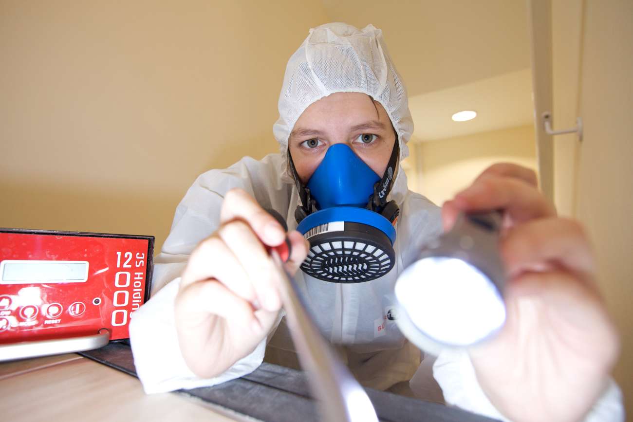 Scientific Services technician with testing equipment