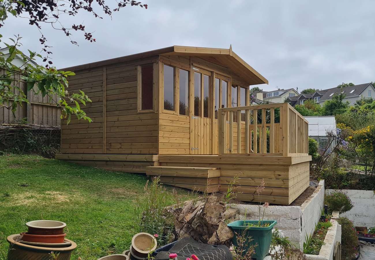 Timber summerhouse with a decked veranda